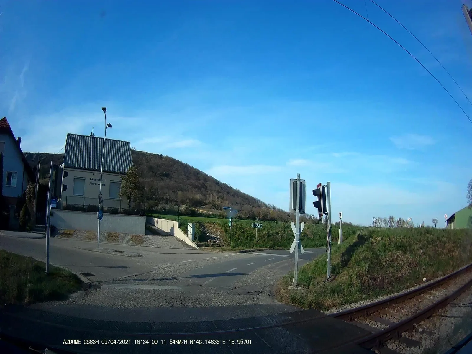 Street-level view of a level crossing in Austria