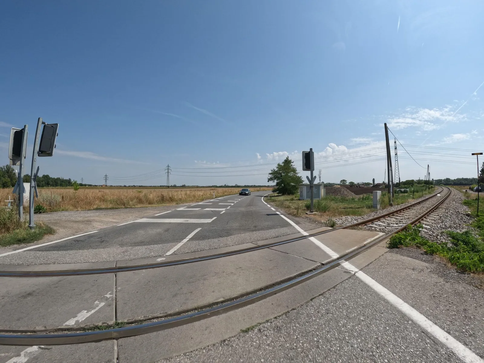 Street-level view of a level crossing in Austria