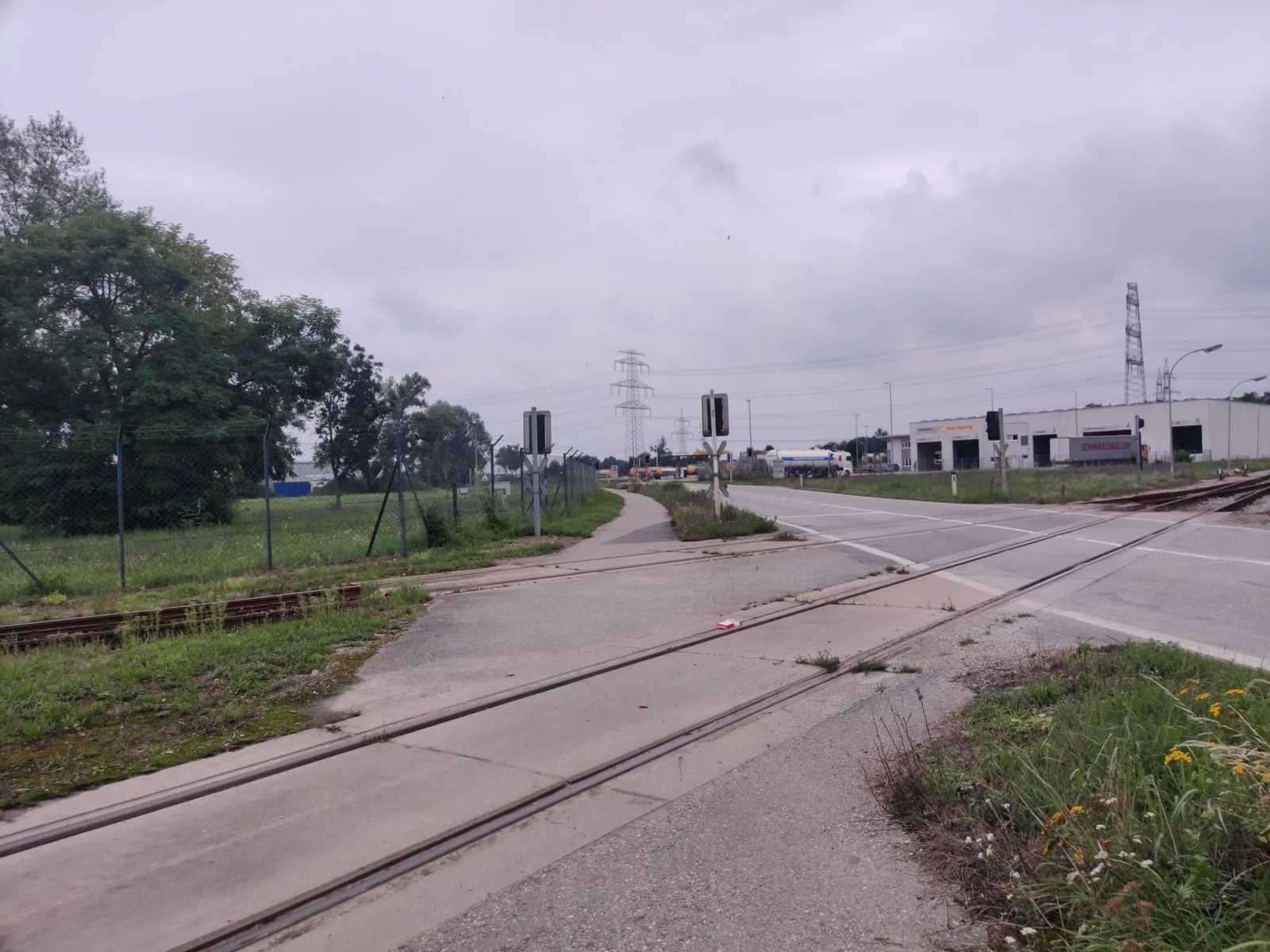Street-level view of a level crossing in Austria