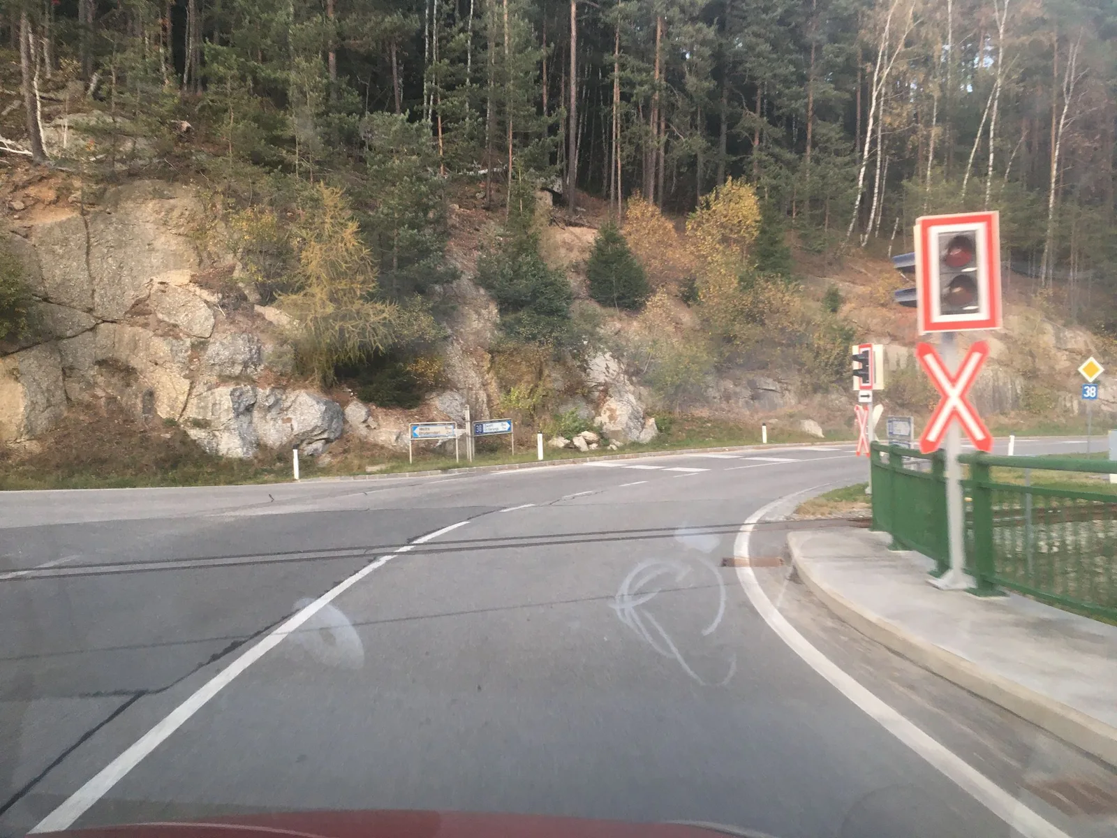 Street-level view of a level crossing in Austria