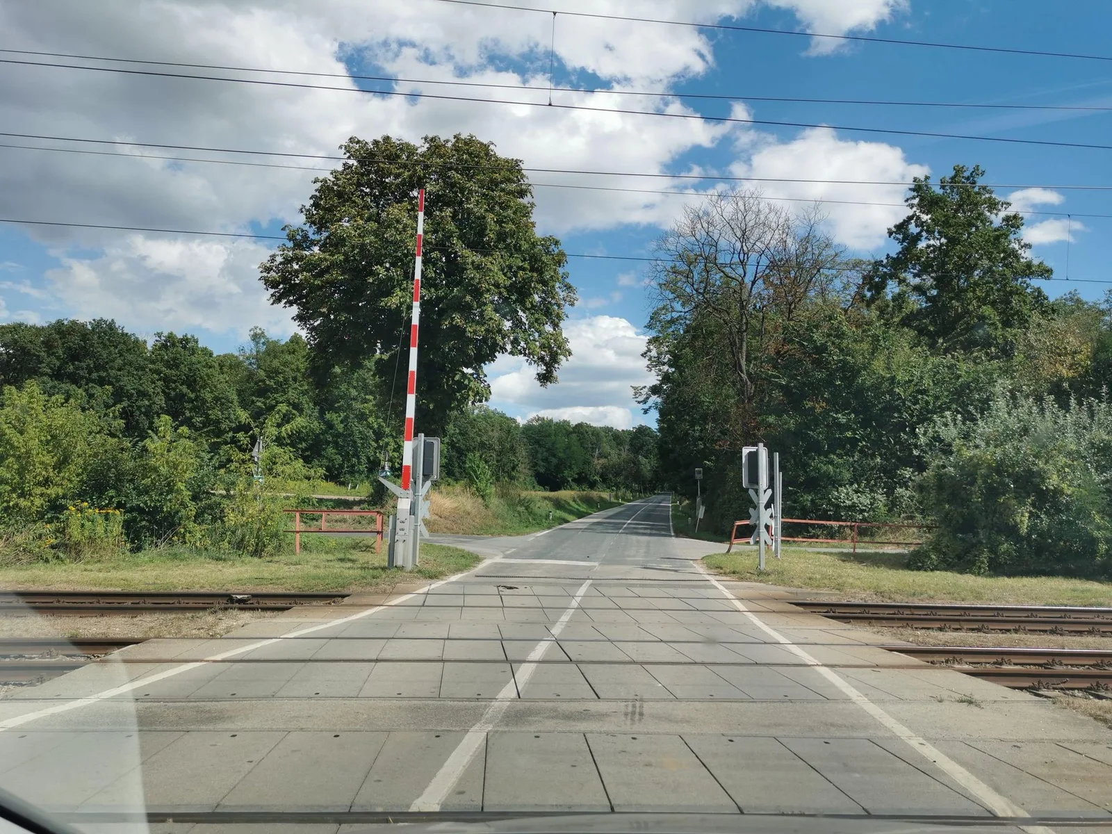 Street-level view of a level crossing in Austria