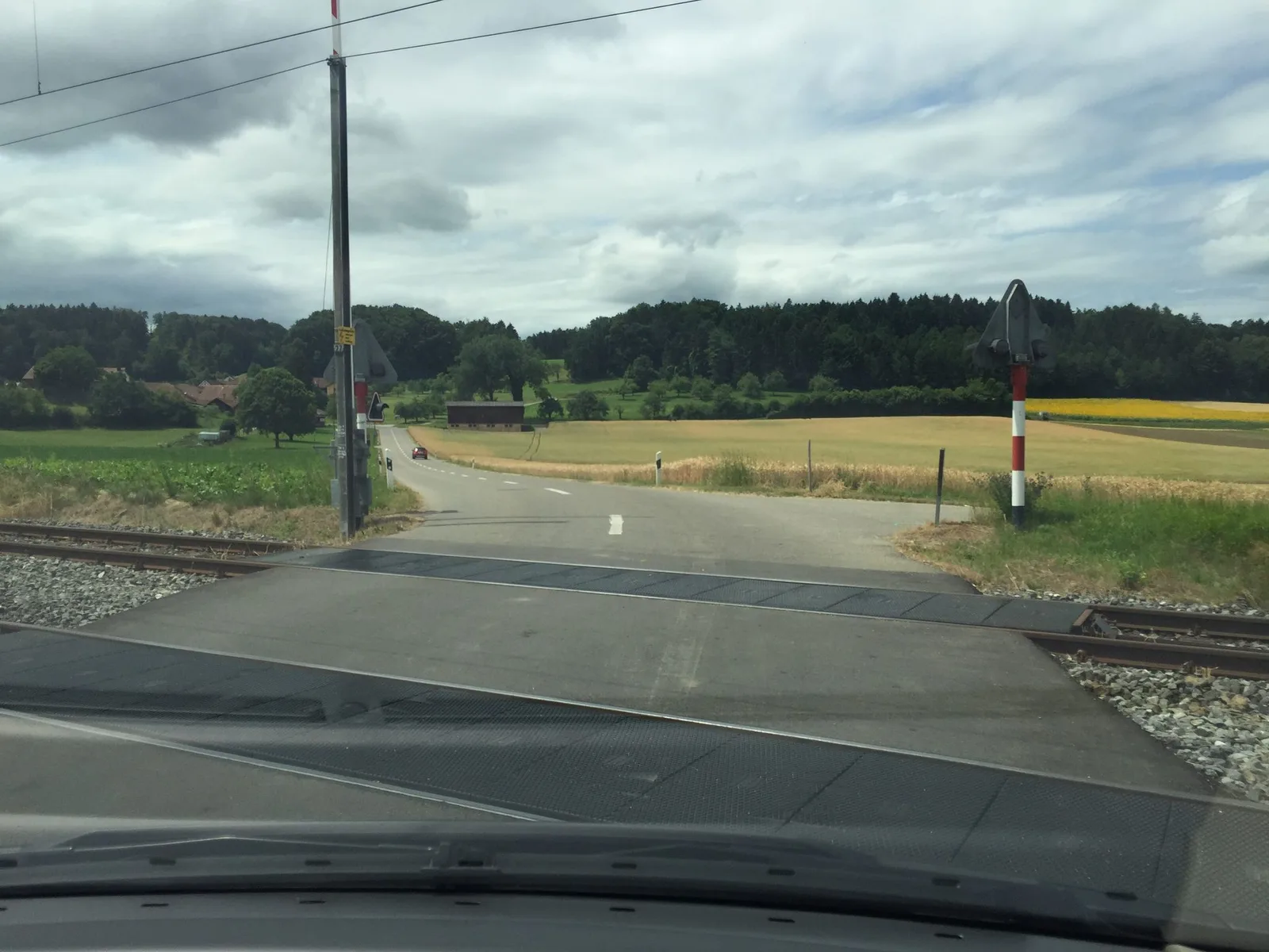Street-level view of a level crossing in Switzerland