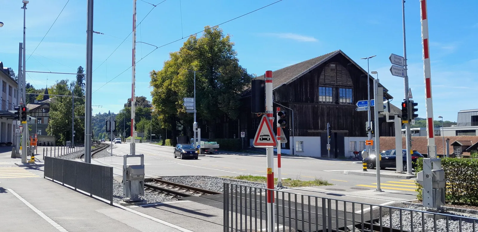 Street-level view of a level crossing in Switzerland