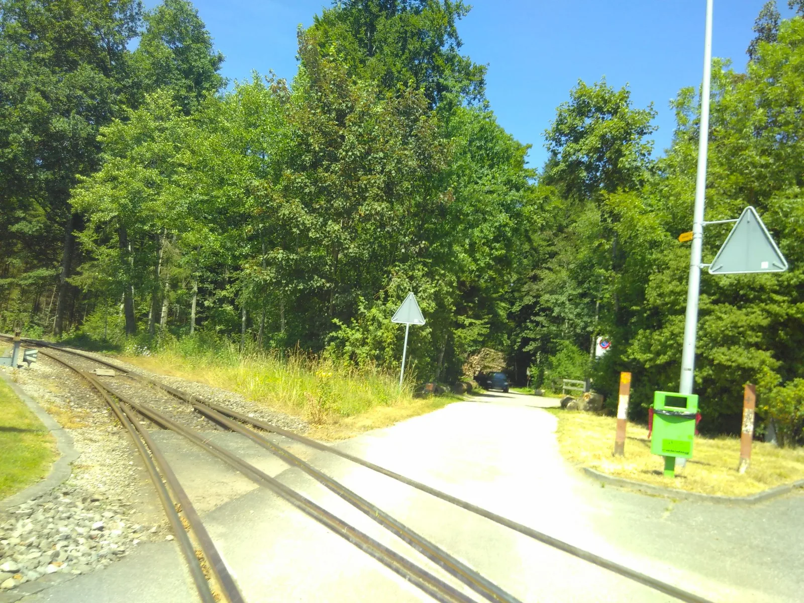 Street-level view of a level crossing in Switzerland