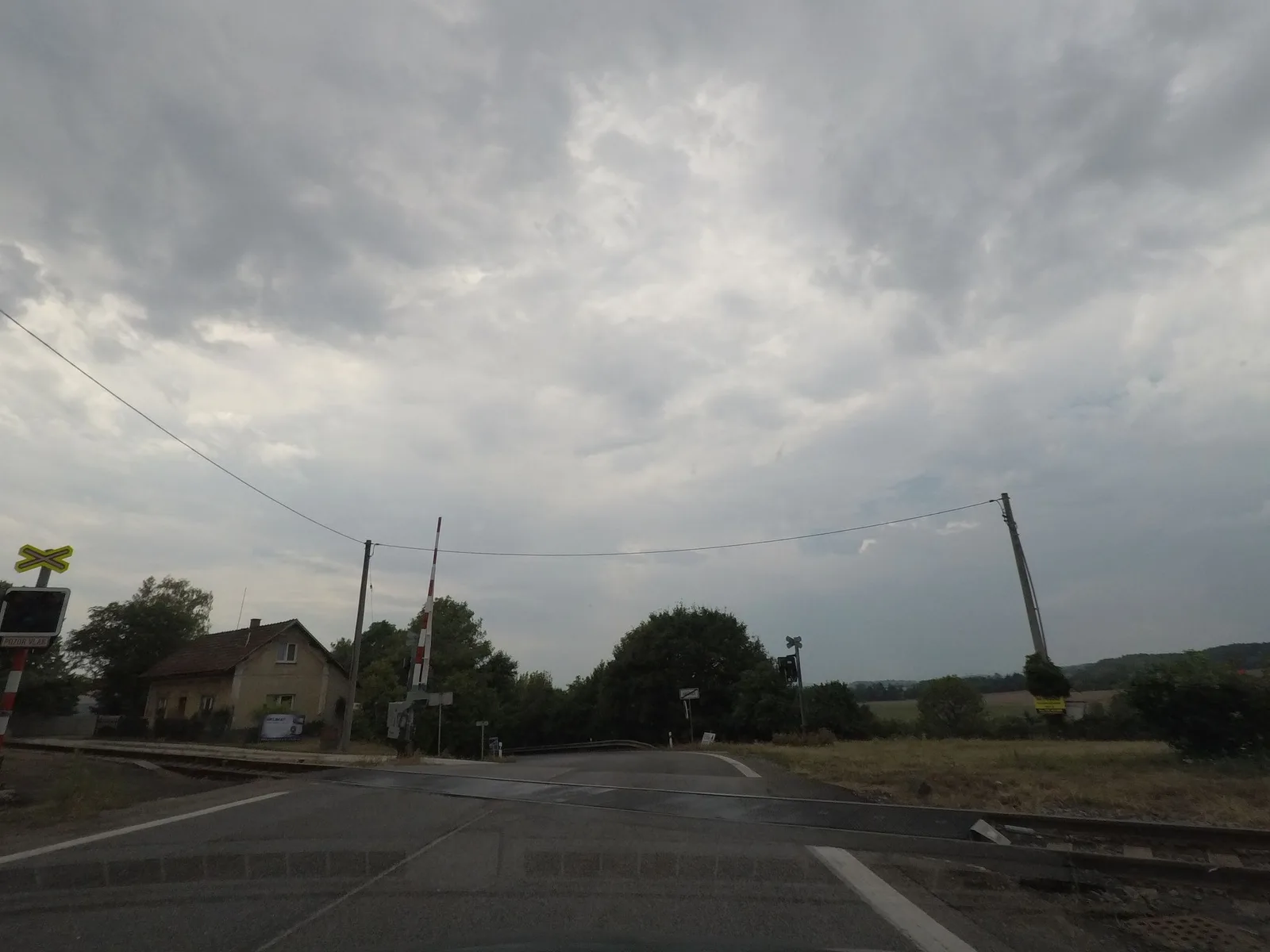 Street-level view of a level crossing in the Czech Republic