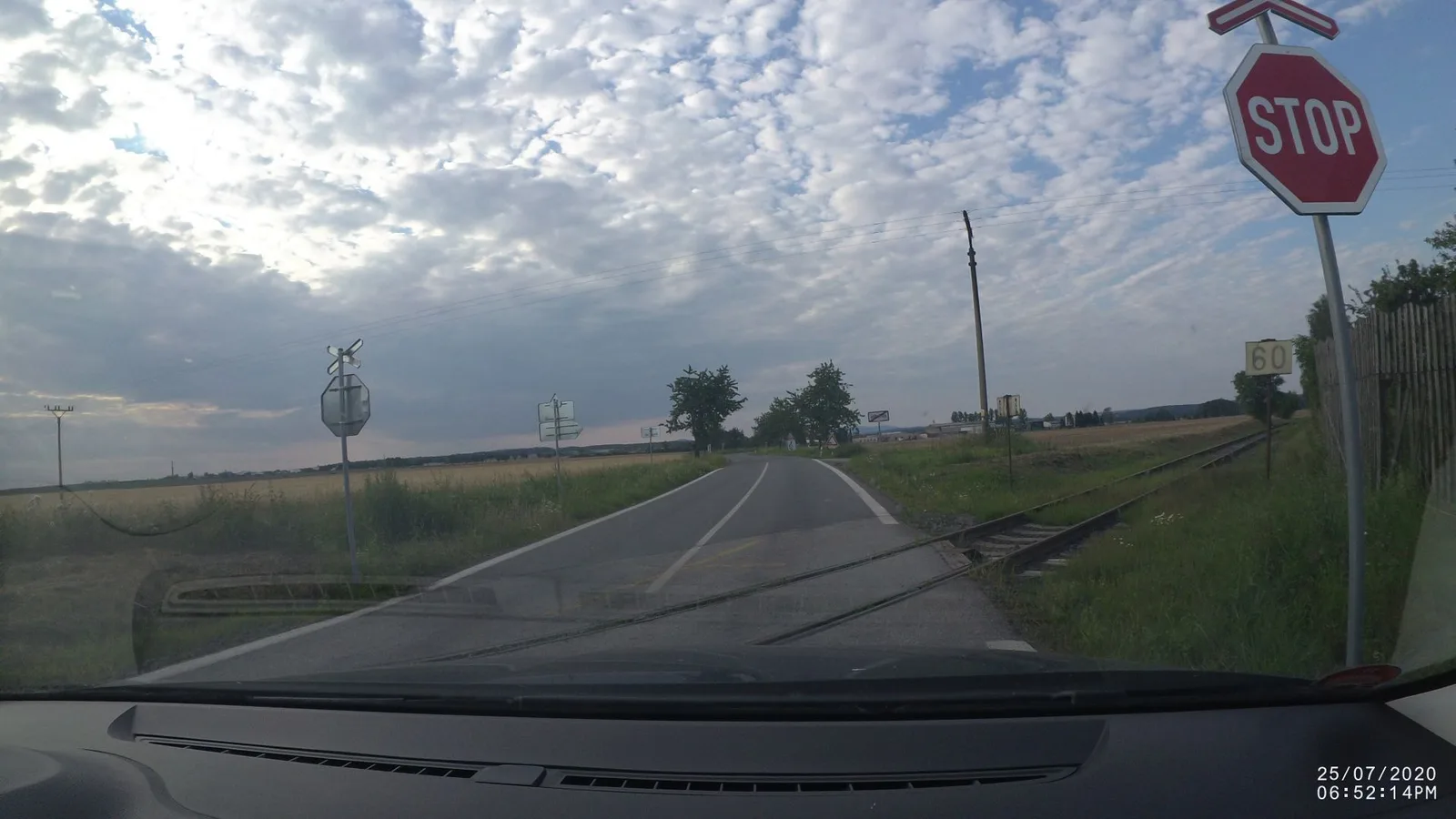 Street-level view of a level crossing in the Czech Republic