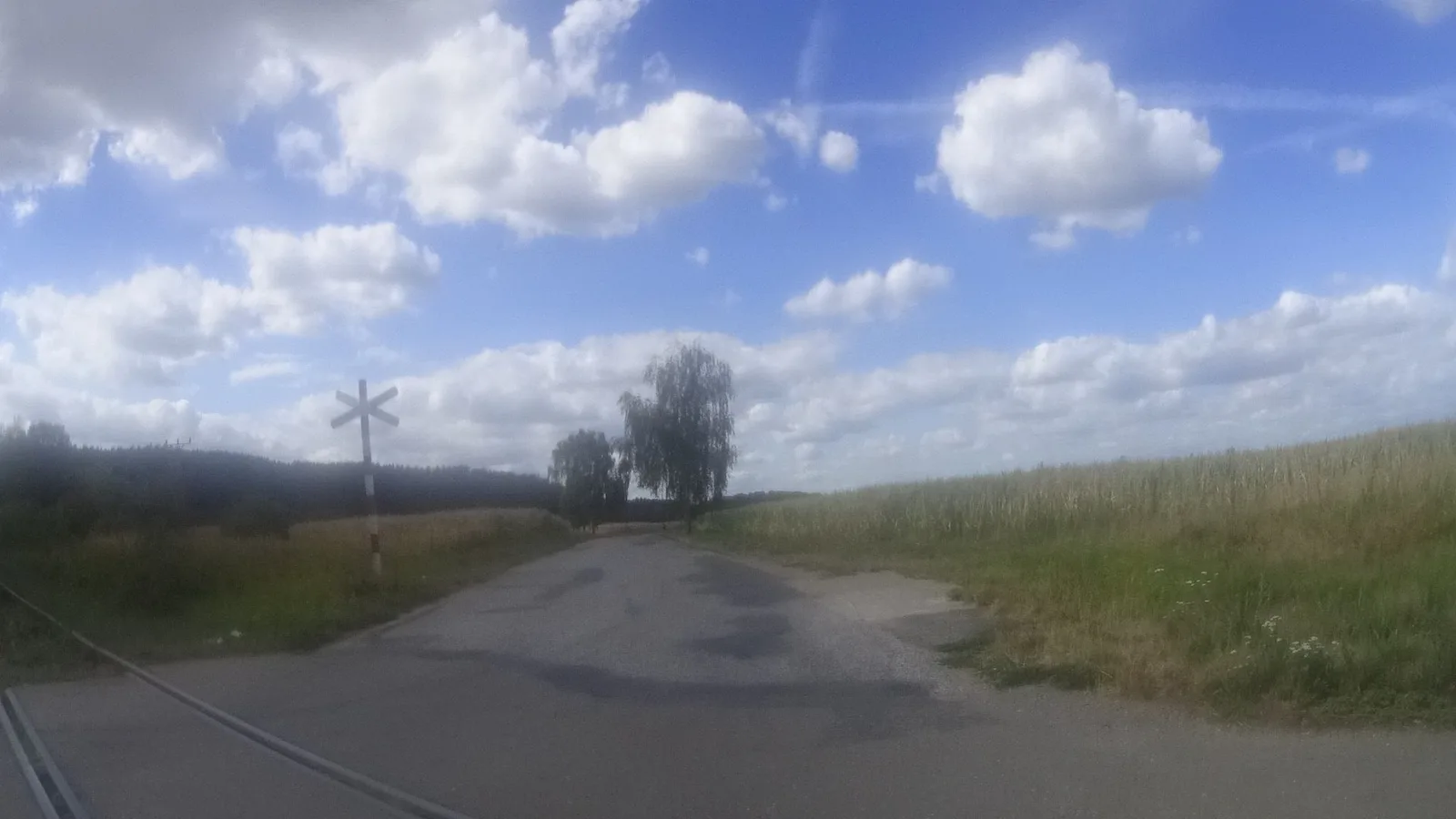 Street-level view of a level crossing in the Czech Republic