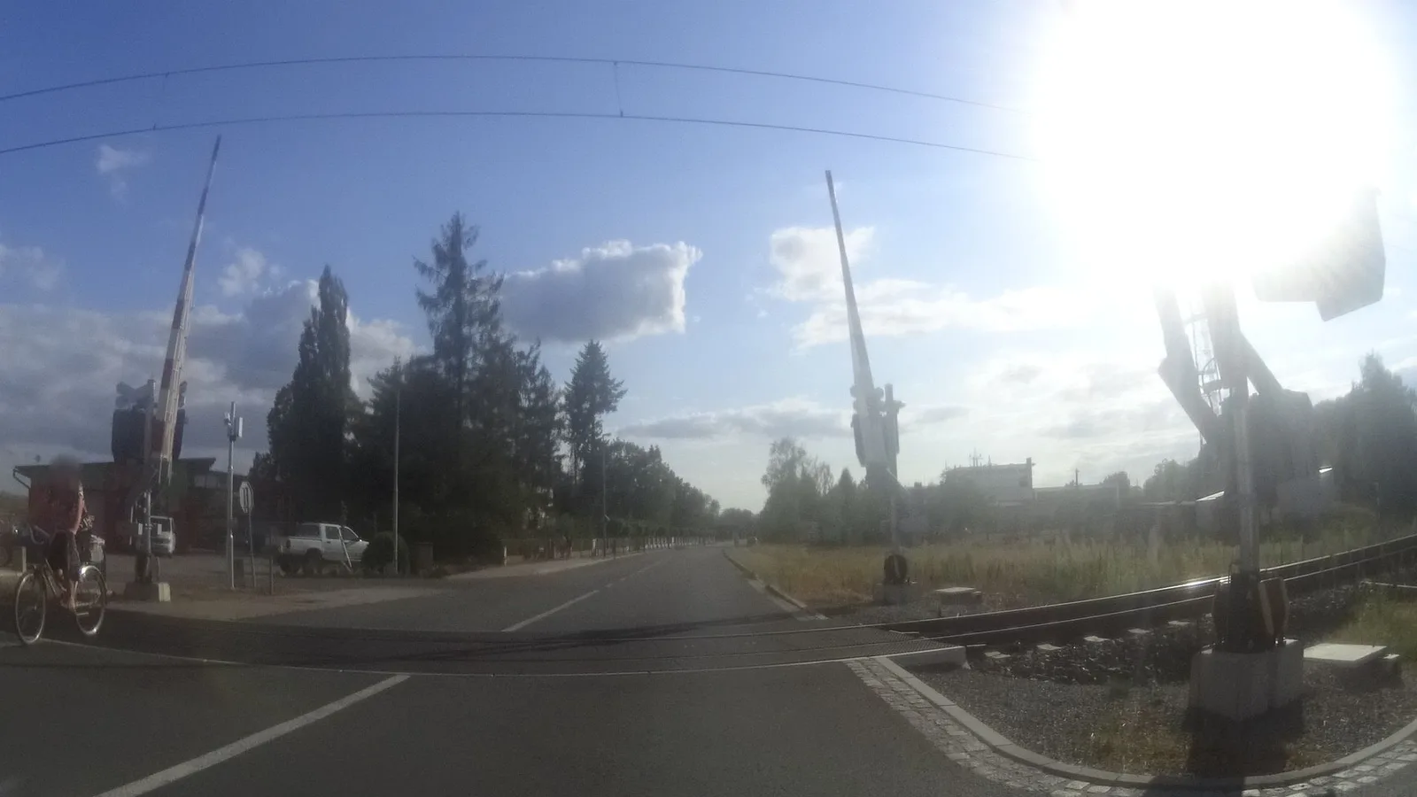 Street-level view of a level crossing in the Czech Republic