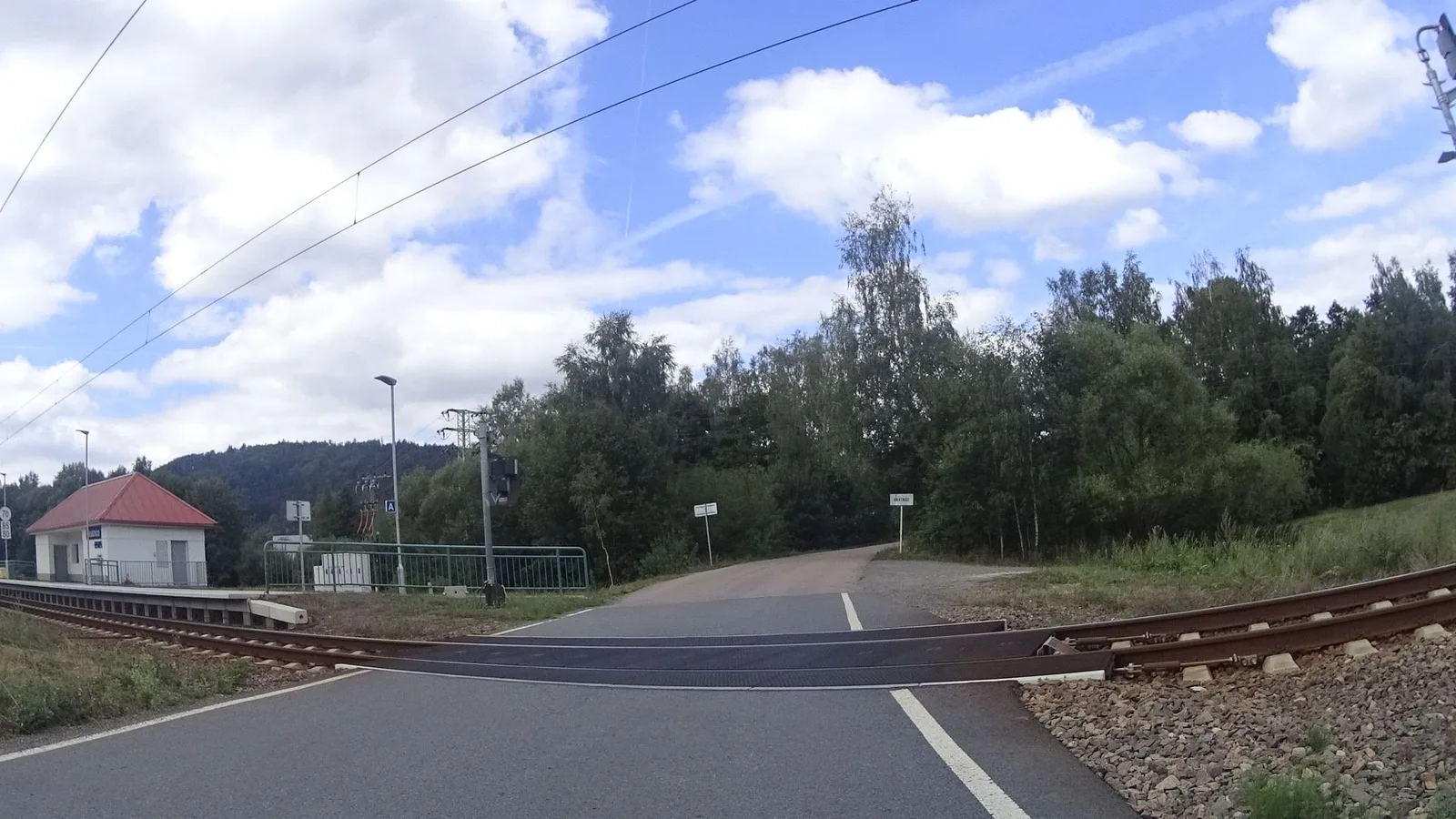 Street-level view of a level crossing in the Czech Republic