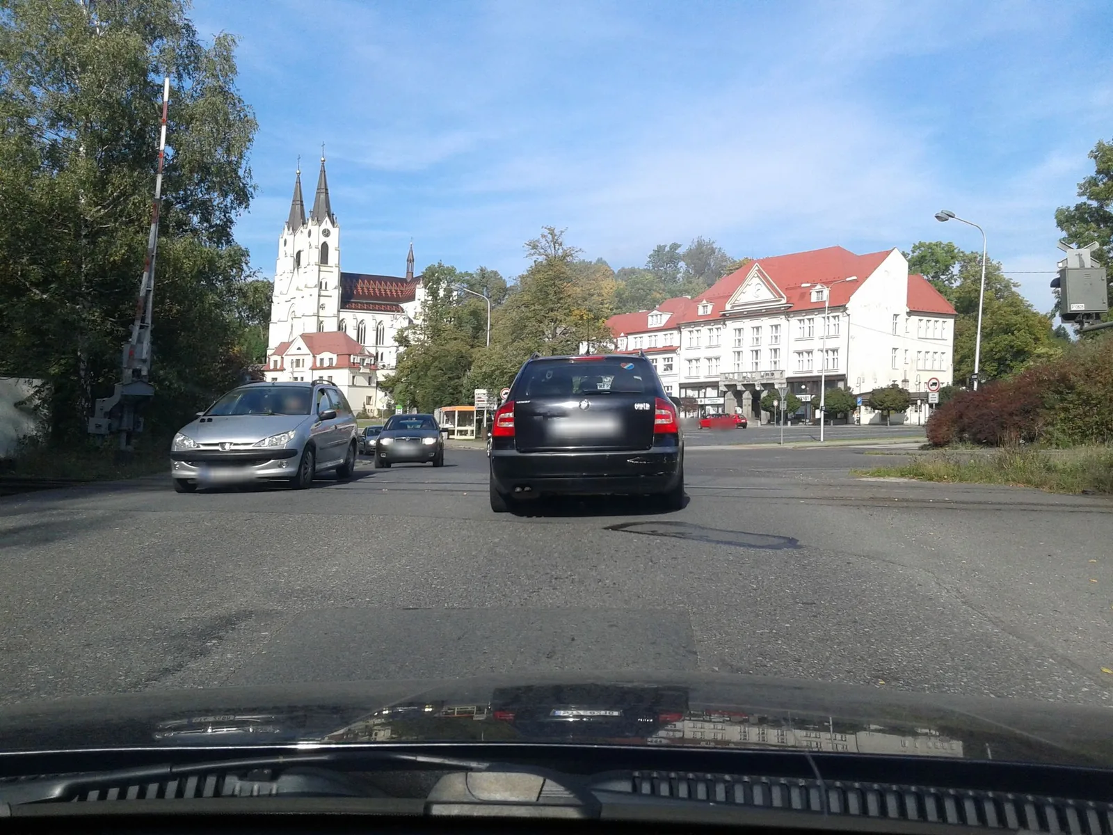 Street-level view of a level crossing in the Czech Republic