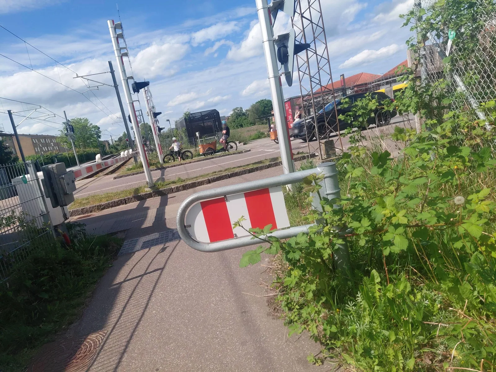 Street-level view of a level crossing in Denmark