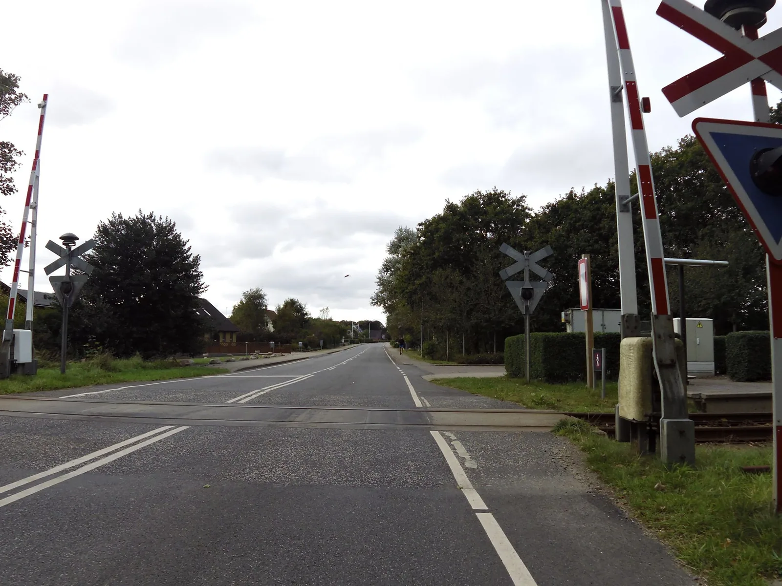 Street-level view of a level crossing in Denmark