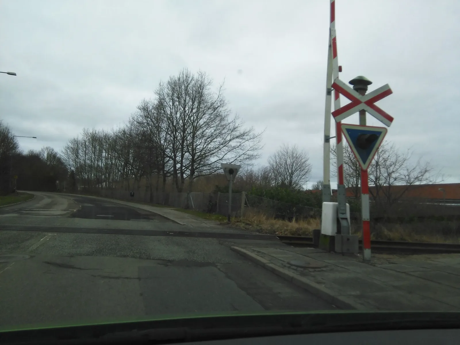 Street-level view of a level crossing in Denmark