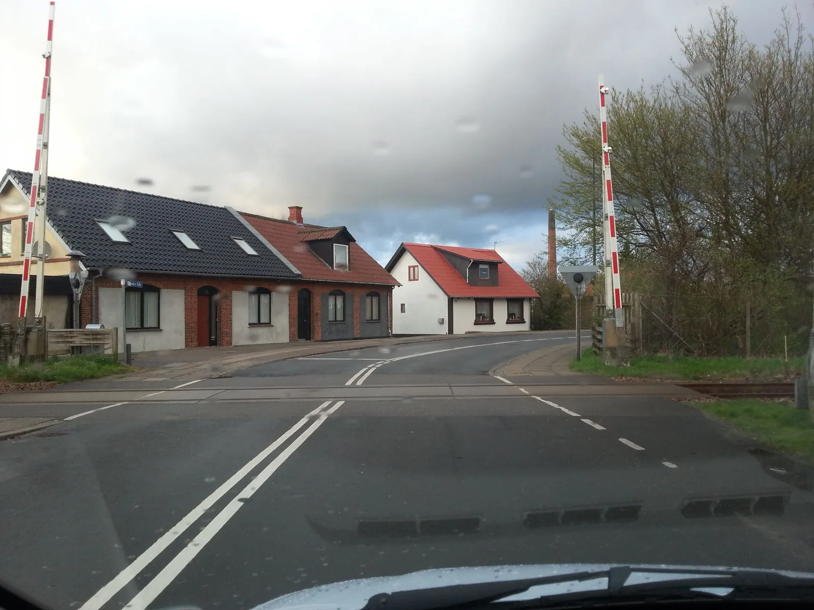 Street-level view of a level crossing in Denmark