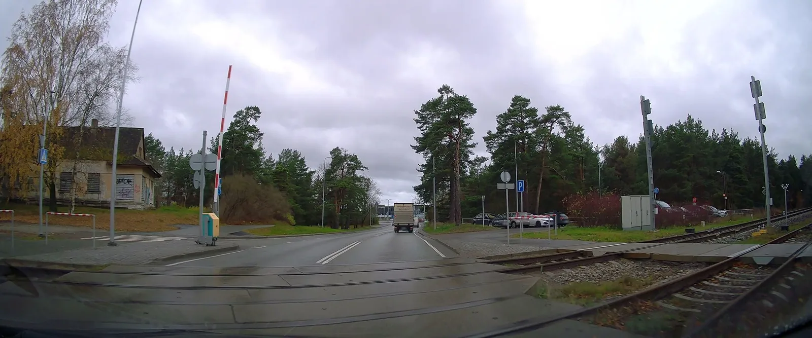 Street-level view of a level crossing in Estonia