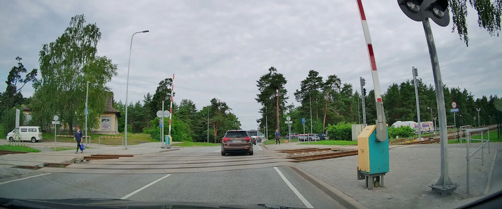 Street-level view of a level crossing in Estonia
