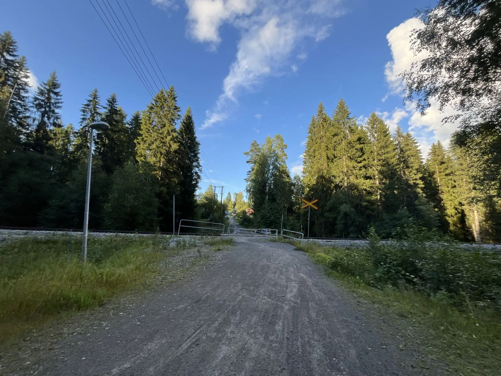 Street-level view of a level crossing in Finland