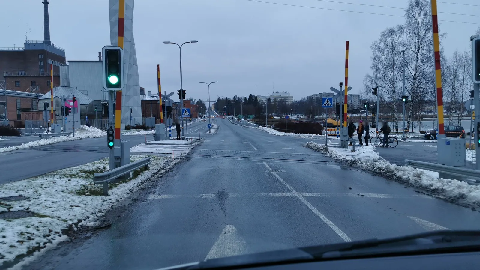 Street-level view of a level crossing in Finland