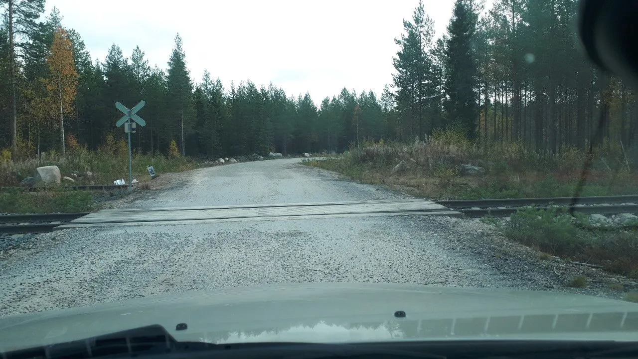 Street-level view of a level crossing in Finland