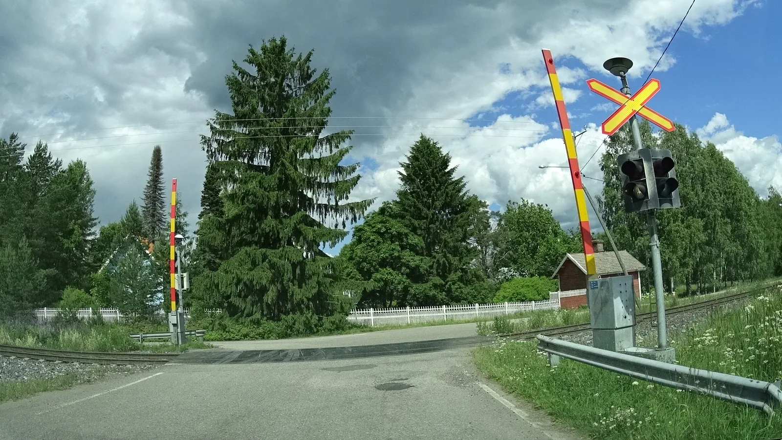 Street-level view of a level crossing in Finland