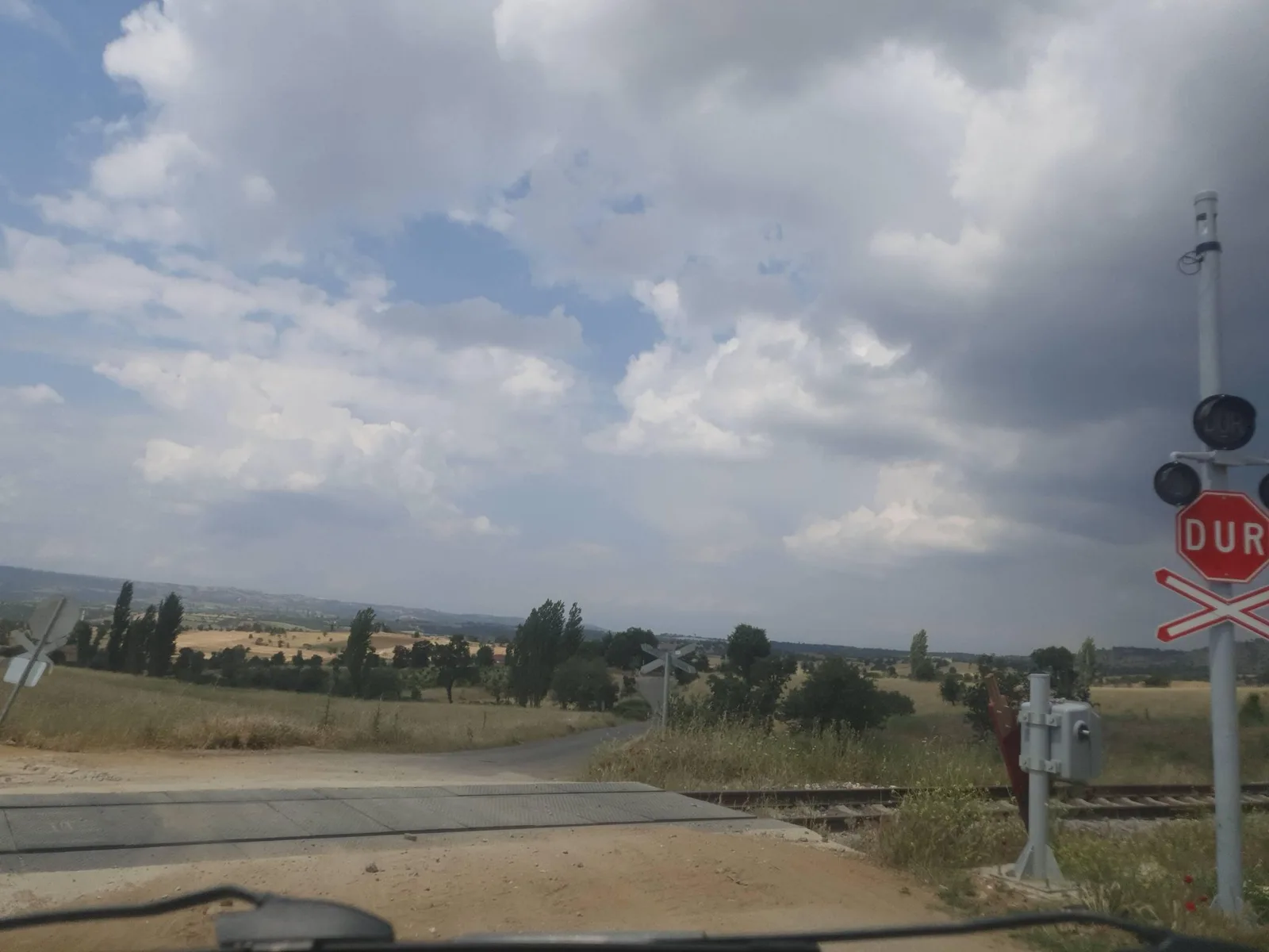 Street-level view of a level crossing in Greece