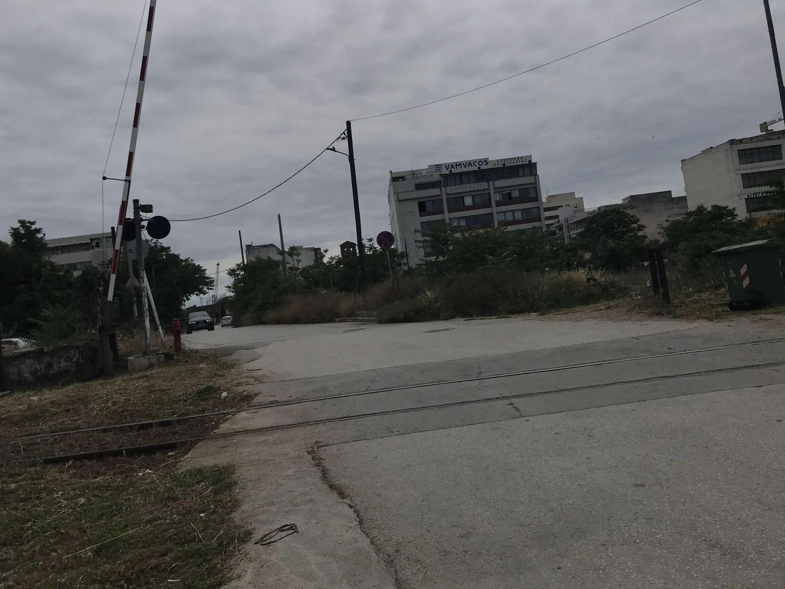 Street-level view of a level crossing in Greece