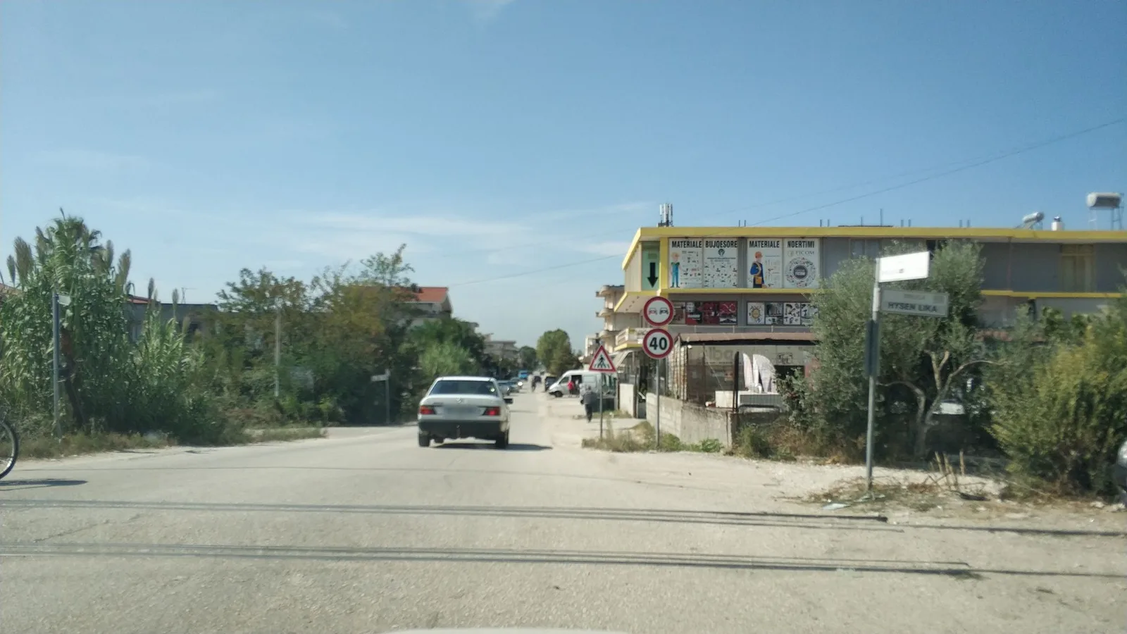 Street-level view of a level crossing in Greece