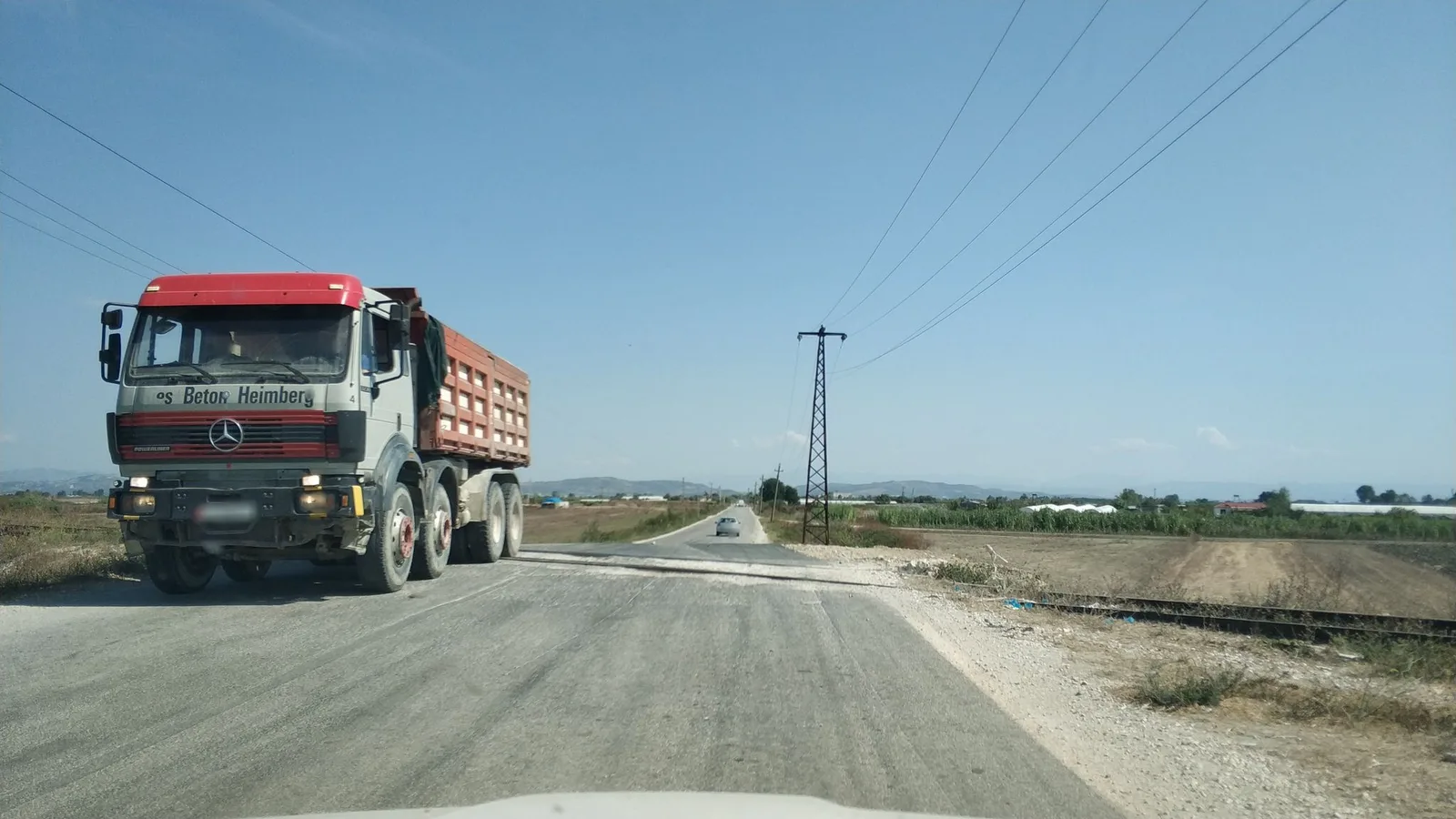 Street-level view of a level crossing in Greece