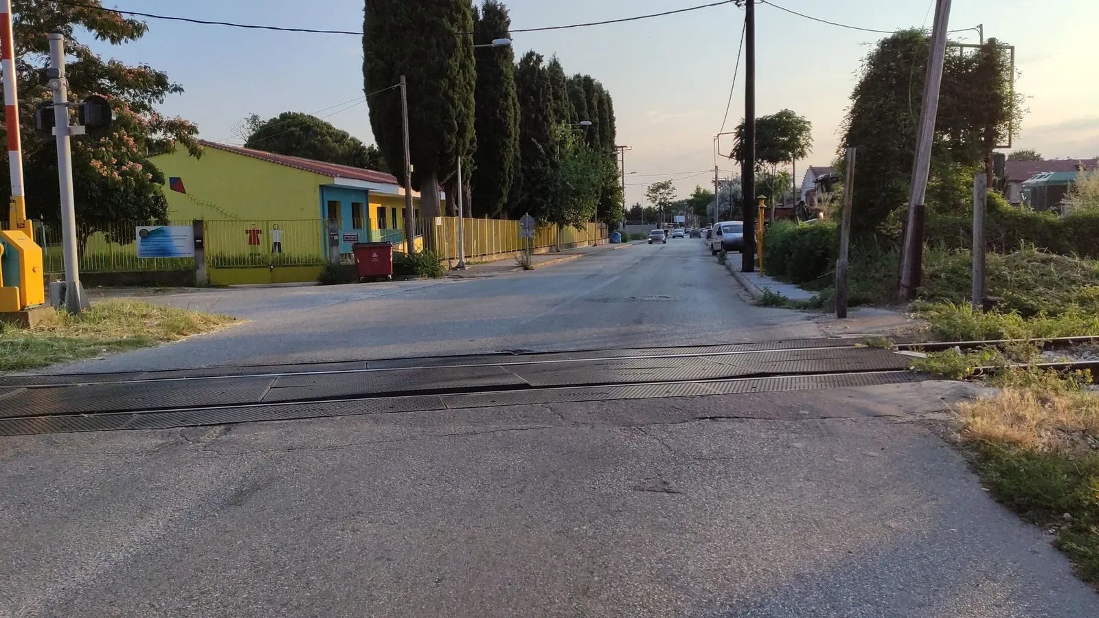 Street-level view of a level crossing in Greece