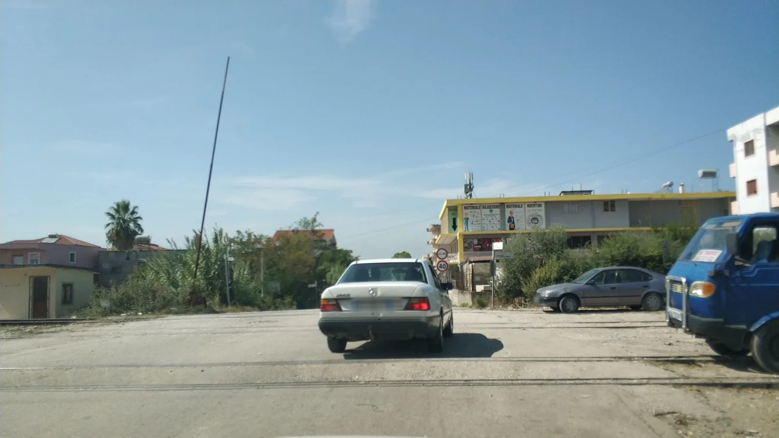 Street-level view of a level crossing in Greece