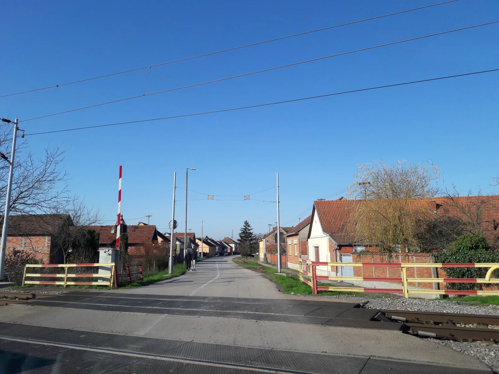 Street-level view of a level crossing in Croatia