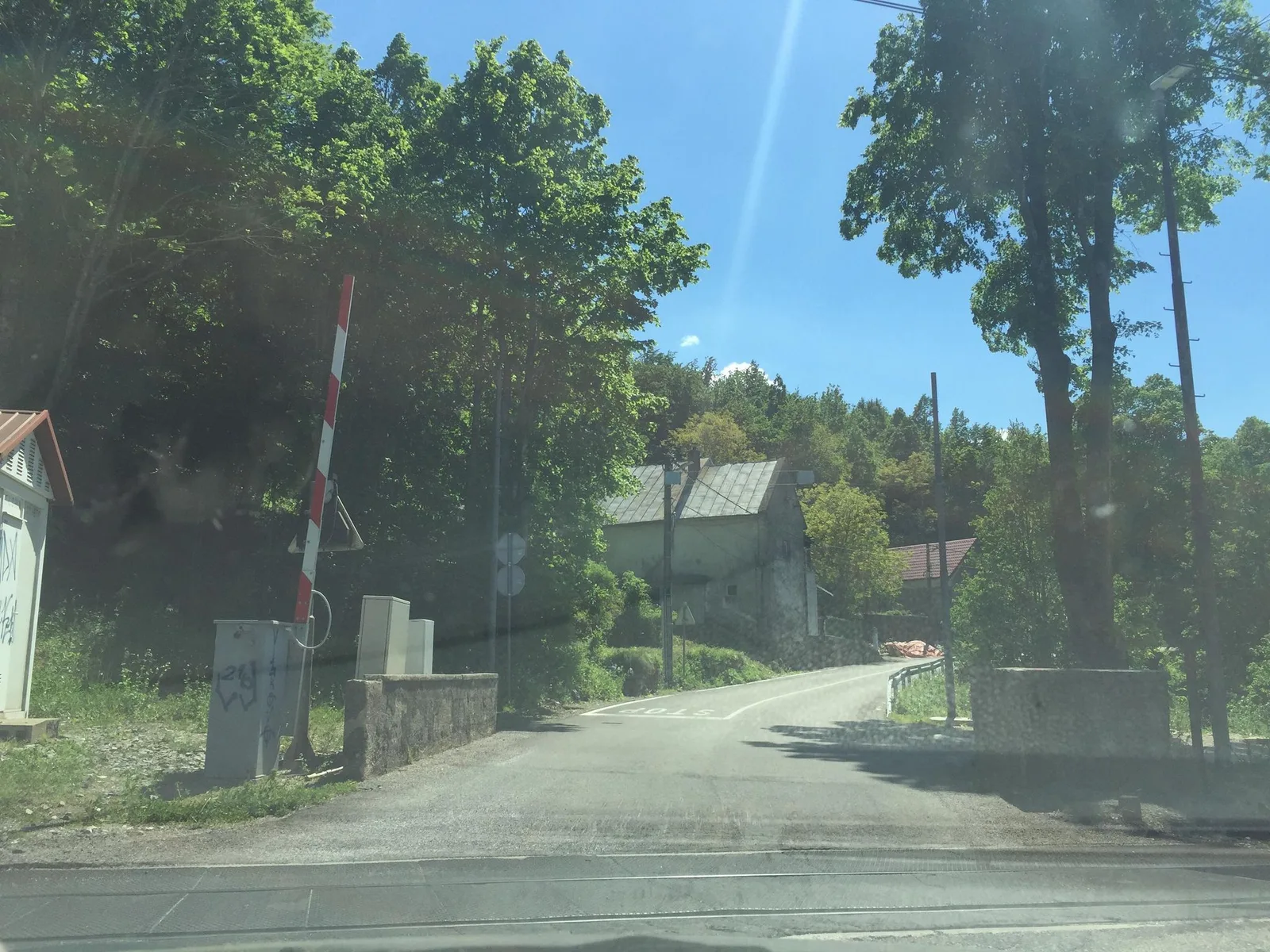 Street-level view of a level crossing in Croatia