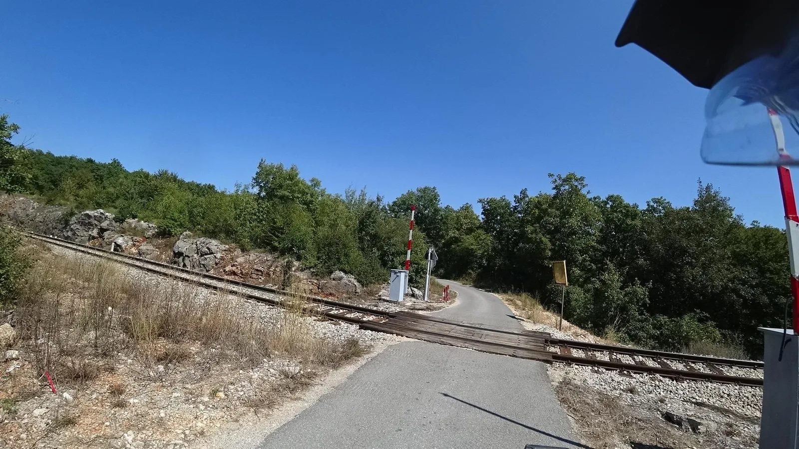Street-level view of a level crossing in Croatia