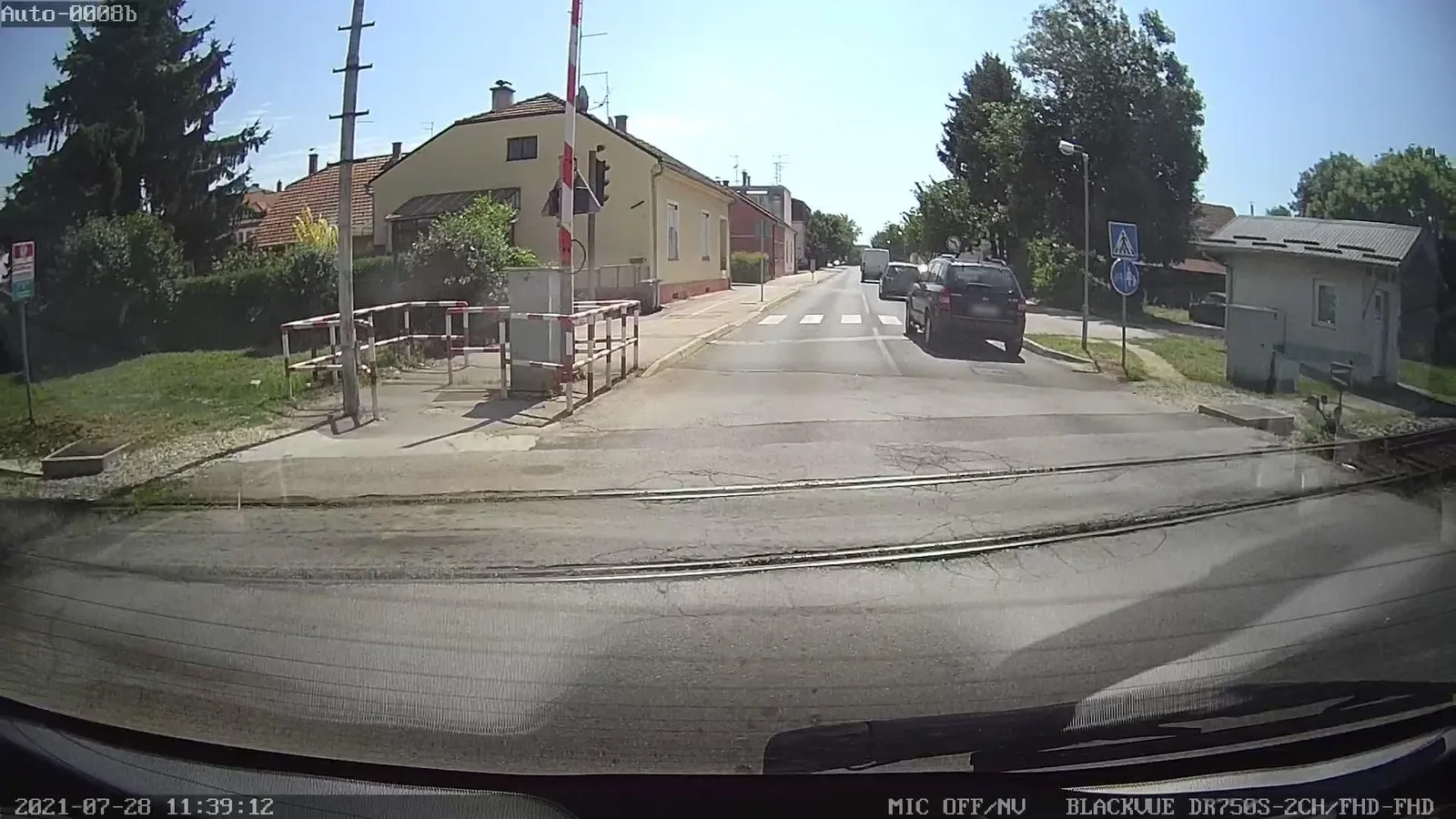 Street-level view of a level crossing in Croatia
