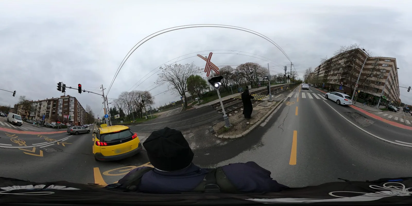 Street-level view of a level crossing in Hungary
