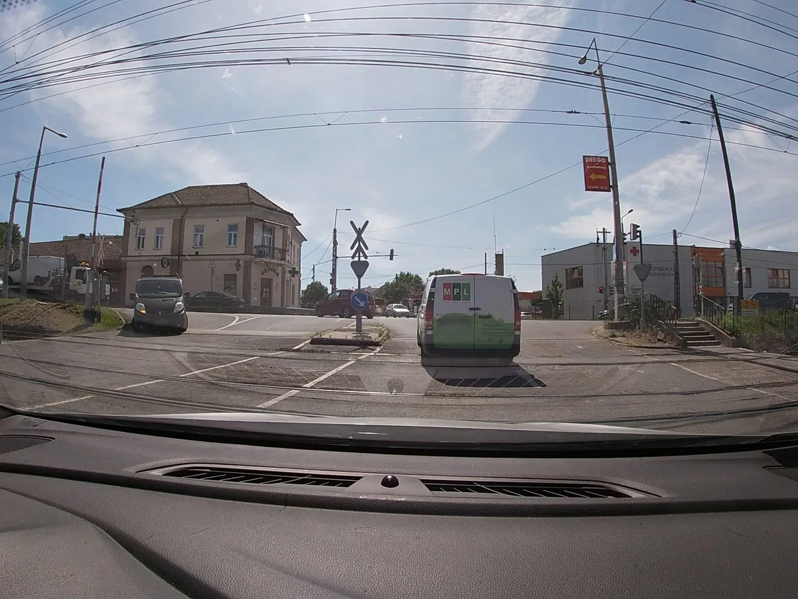 Street-level view of a level crossing in Hungary