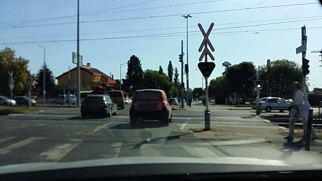 Street-level view of a level crossing in Hungary