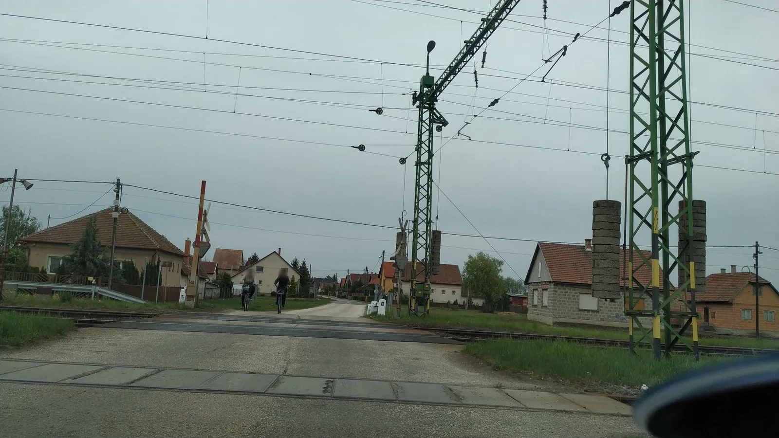Street-level view of a level crossing in Hungary