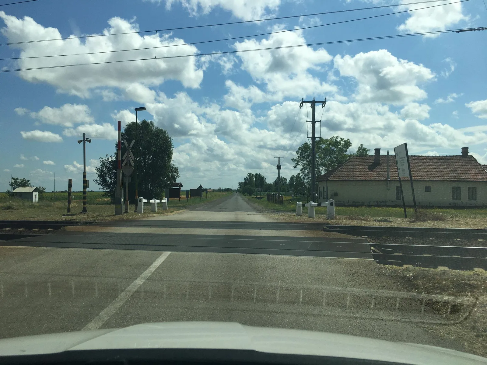 Street-level view of a level crossing in Hungary