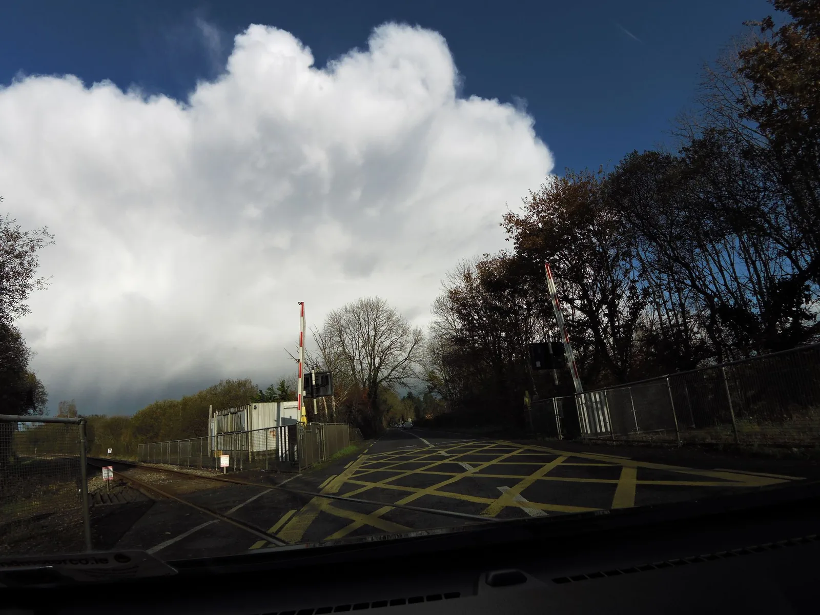 Street-level view of a level crossing in Ireland
