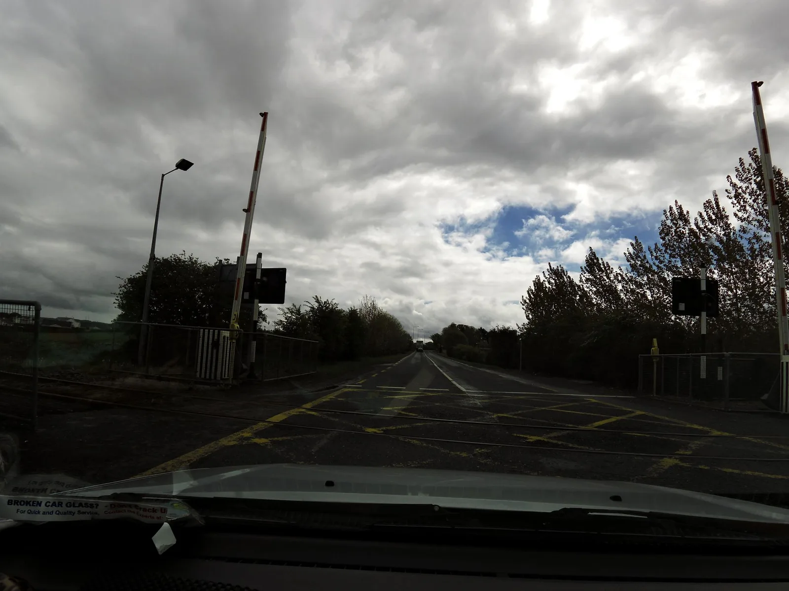 Street-level view of a level crossing in Ireland