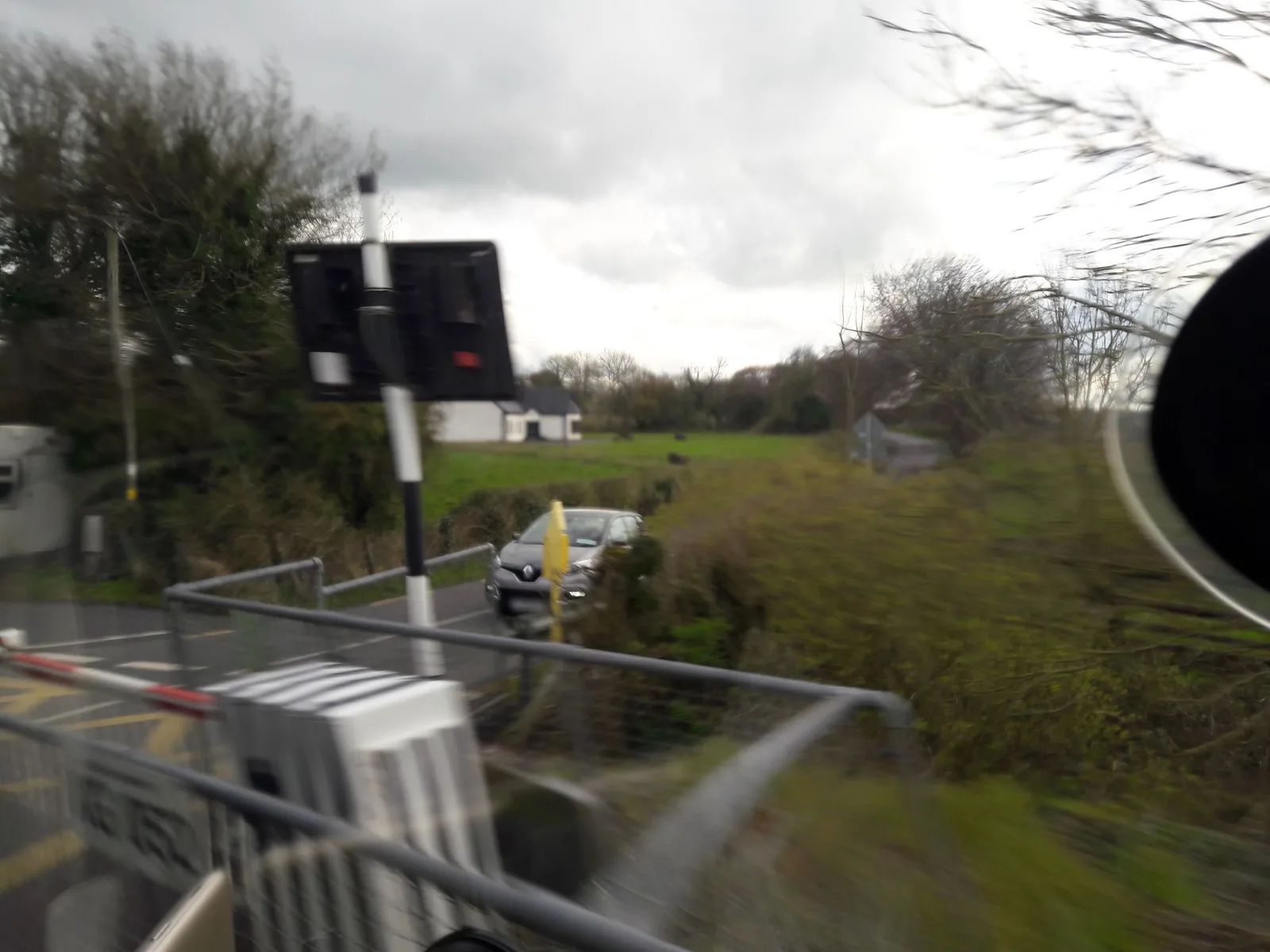Street-level view of a level crossing in Ireland