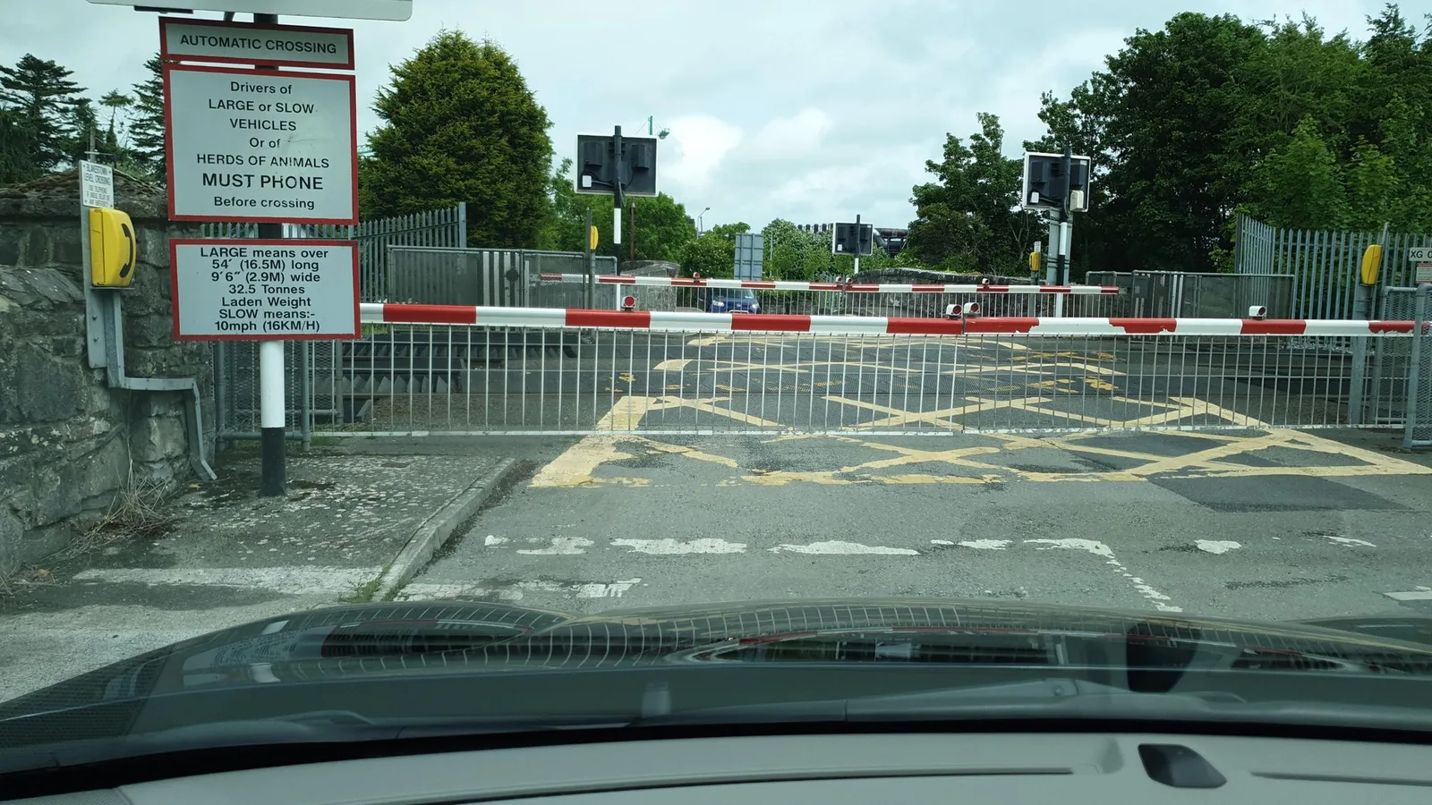 Street-level view of a level crossing in Ireland
