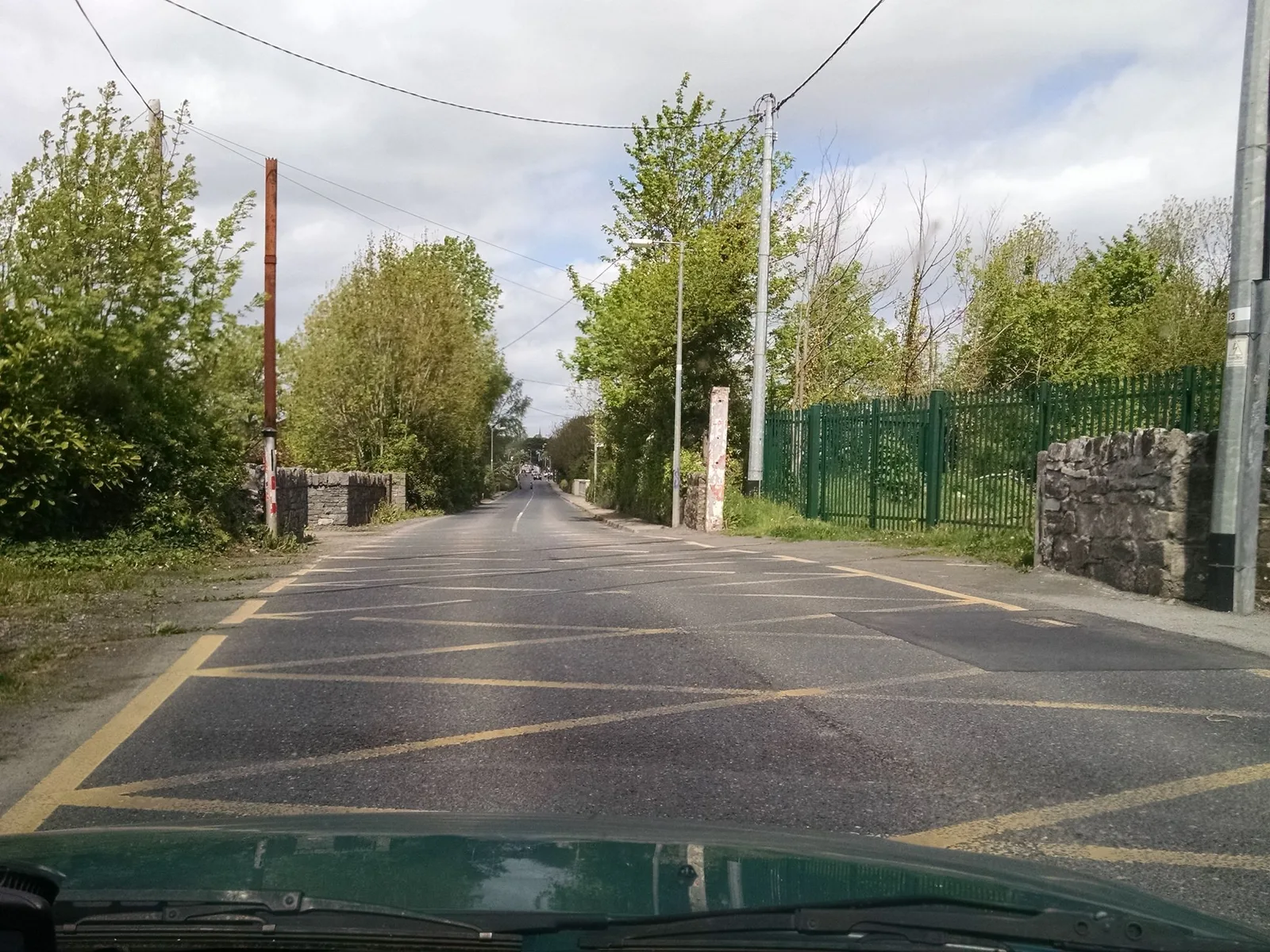 Street-level view of a level crossing in Ireland