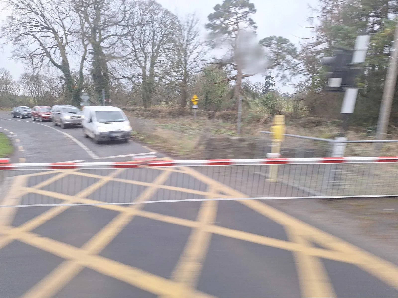 Street-level view of a level crossing in Ireland