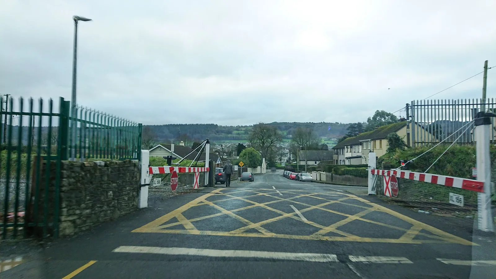 Street-level view of a level crossing in Ireland