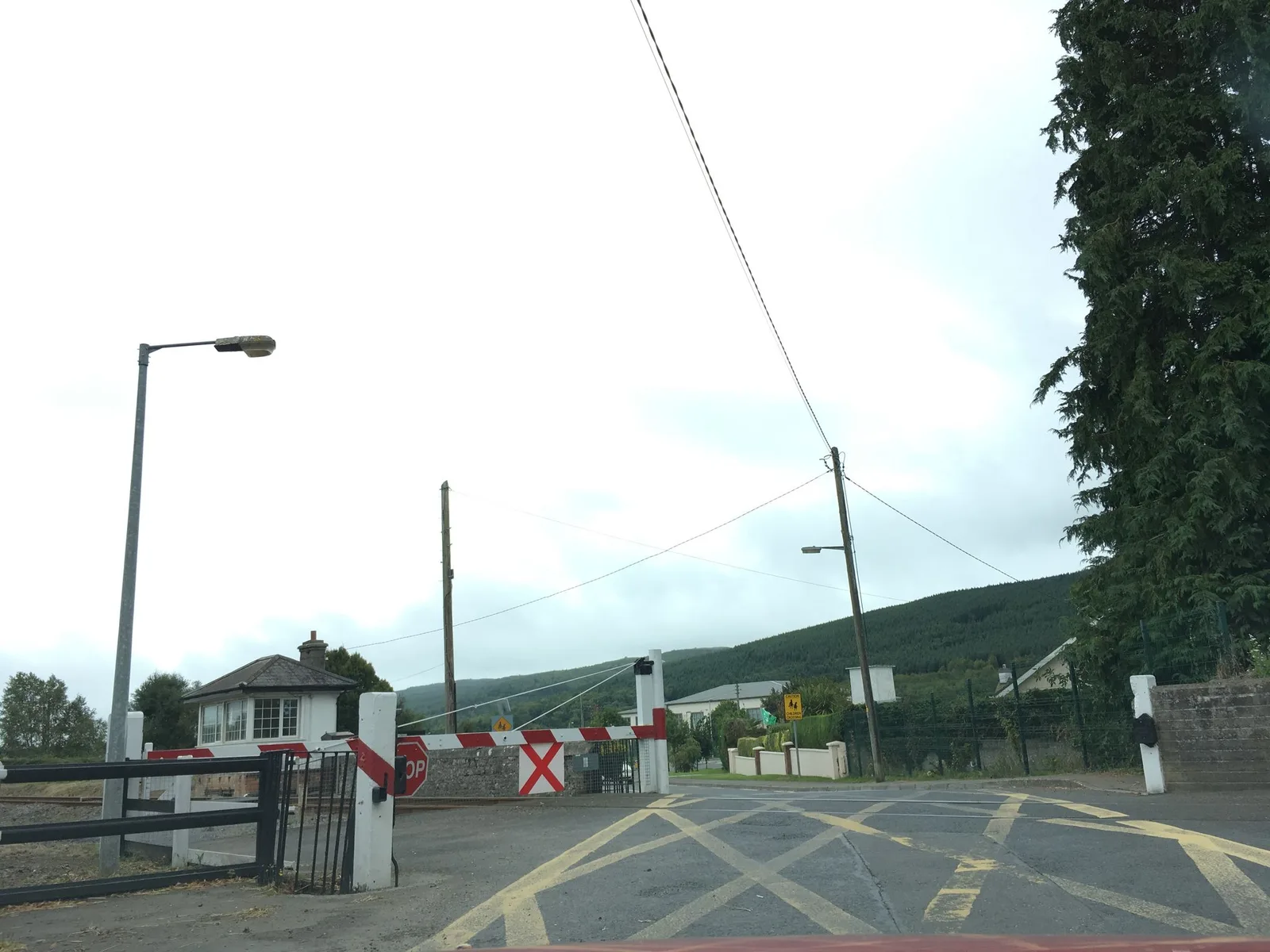 Street-level view of a level crossing in Ireland