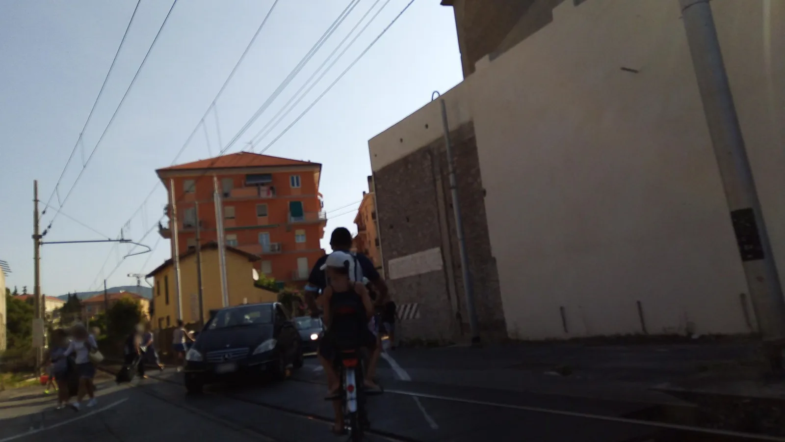 Street-level view of a level crossing in Italy