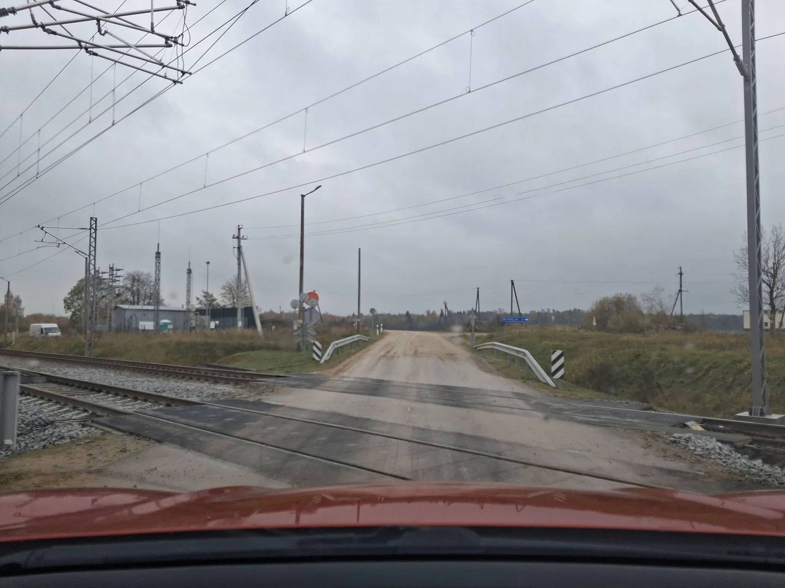Street-level view of a level crossing in Lithuania