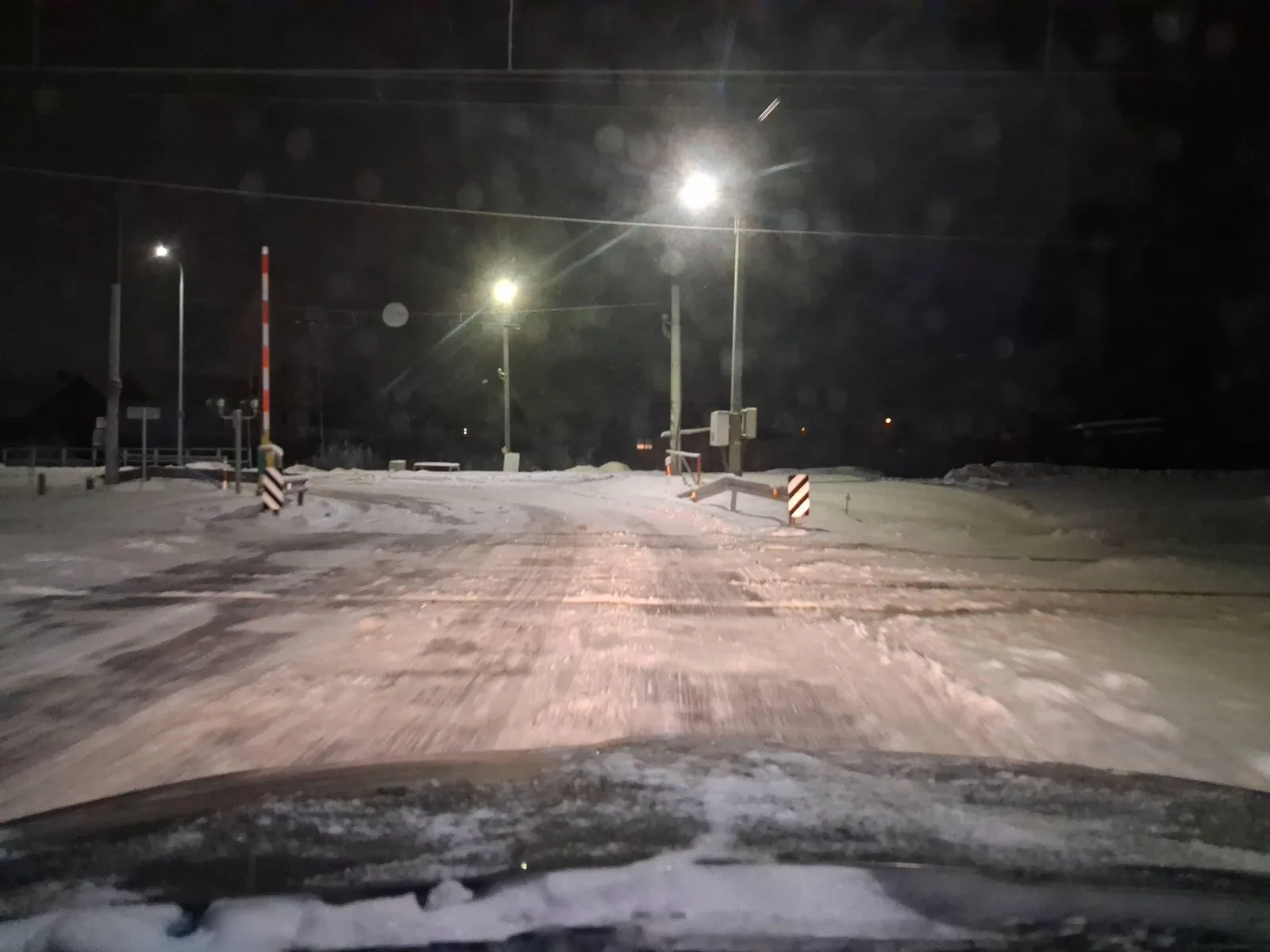 Street-level view of a level crossing in Lithuania